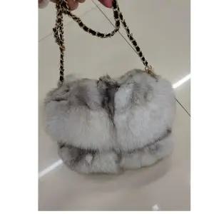 루엔 천연폭스퍼 숄더백