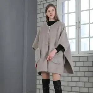 11FAUX FUR라운드케이프 판초