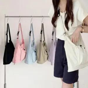 아웃도어 나일론 스트링 크로스백 가방 여성 여자 가 WEC88B6