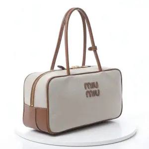 [미우미우]25FW 캔버스 가죽 보 백 5BB163 ACRN F062F 818071