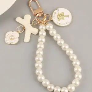 가방 자동차 키 열쇠 여자 진주 스트랩 키링 크림 WF4C352