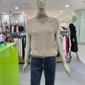 시슬리/애플아울렛/캐시미어 터들넥 홀가먼트 슬리브리스 니트 SAKPA7441