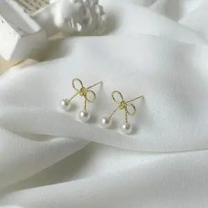 진주 리본 귀걸이 여성 유니크 데일리 패션 악세사리 (WFKBJIU)