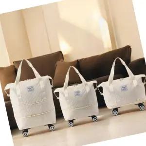 바퀴보스턴백아이보리 아이러빗 2단 확장 보스턴백