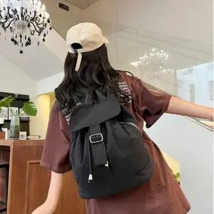 여성 4컬러 플랩 스트링 나일론 경량백팩 데일리가방