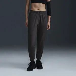 나이키 나이키 여성 드라이 핏 러닝 팬츠 HQ3247-254 1401982
