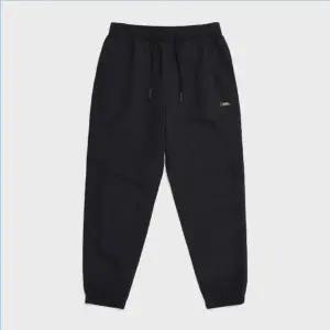 [롯데백화점]내셔널지오그래픽 공용 배색 바람막이 셋업 팬츠 N233UPT080