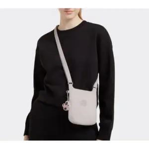 갤러리아 키플링 핸드폰백 미니 크로스백 하비에르 연핑크 KMABS50 WFPK