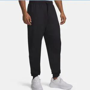 [언더아머](대전신세계)6011069-001 블랙 UA 모션 남성 조거 팬츠 부드러운 소재 신축성 좋은 긴바지 운...