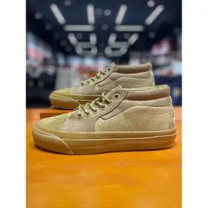 반스 남여공용 TDC 스케이트 미드 리이슈 83 스니커즈 카멜 VN000E7J5QJ