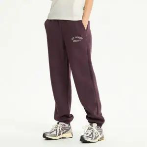 뉴발란스G. WOMEN 아치형 그래핏 기모 조거팬츠 NBMLE4S032-75