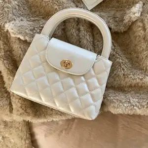 [옷자락]여성용 미니 퀼팅 가죽 크로스백 핸들 체인백