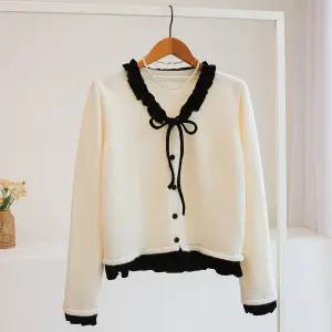 [잇수다] 벨프론 리본 벨벳 프릴 레이어드 브이넥 니트 가디건