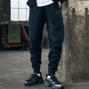 나이키 NSW 테크 남성 플리스 조거 팬츠 HV0960-010