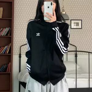 [아디다스]아디다스 베켄바우어 파이어버드 트랙탑 져지 IY8077