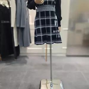 [에고이스트]체크 자카드 플레어 미니 니트 스커트 EQ4KS260BK_CA