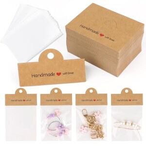 200개 주얼리 포장 세트 카드 크래프트 있습니다 100개 디스플레이 키트에는 포함되어 100개의 중소기업용 귀걸이가 포함된 가방이 브라운 팔찌 투명 공예품