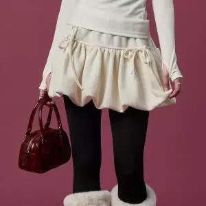 [KOLEAT]방한 니트 벌룬 리본 플레어 밴딩 미니스커트 [IVORY] 치마바지 ver.
