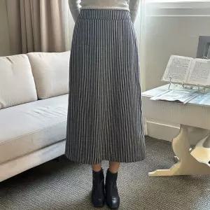 로프 스트라이프 밴딩 뒷트임 롱스커트