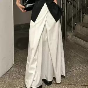 [하프클럽/셀러허브_여성트랜드패션]사선 HL] 랩스커트 플레어 다리라인 롱