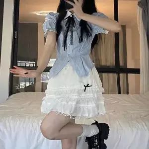 고품질 스카이블루 스트라이프 반팔퍼프 블라우스 쉬폰리본 (WFKJYYR)