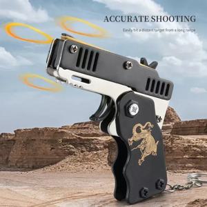 1PC 미니 키 체인 총 고무 밴드 총 장난감 총 슈팅 권총 합금 아이 야외 활동 파티 게임 어린이를위한 생일 선물