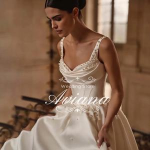 Aviana Pearls Sweetheart A 라인 웨딩 드레스 스파게티 스트랩 스윕 트레인 민소매 비드 프릴 새로운 디자인 우아한 독특한