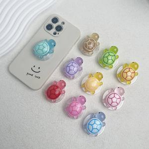 1PC Glow-in-the-Dark 거북이 전화 홀더 미니 수지 거북이 디자인 확장 가능한 접이식 스탠드 모바일 장치 용 미끄럼 방지 ABS 그립