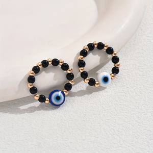 TEMU 블루 아이즈가 돋보이는 세련되고 독특한 빈티지 스타일 커플링 세트 (2개). 수제 비즈와 디자인 특징.