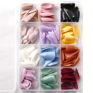 TEMU 288개 아크릴 아몬드 모양 단색 인조 손톱 세트. 레드, 블루, 옐로우, 퍼플, 누드 등 12가지 색상으로 제공됩니다. 광택이 있는 끝단으로 매니큐어에 사용할 수 있습니다.