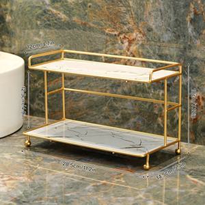 TEMU 금색 메탈 프레임의 이중 레이어 데스크탑 수납 랙. 제품, 아로마테라피 용품 등을 정리할 수 있는 선반으로 구성되어 있습니다. 욕실, 침실 화장대 등 다양한 환경에 적합합니다.