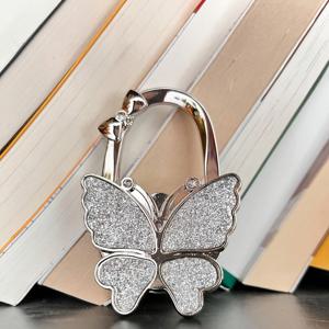 TEMU 여성을 위해 디자인된 시크한 접이식 나비 가방 후크 - 반짝이는 메탈 핸드백 홀더, 벽 및 데스크탑을 위한 편리한 공간 효율적인 정리함, 지갑 및 클러치에 이상적, 단일 액세서리로 포장