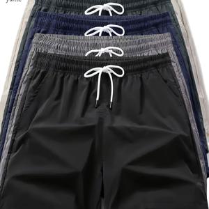 TEMU 남성용 캐주얼 루즈핏 속건성 반바지 5가지 색상: 블랙, 그레이, 네이비 블루, 아미 그린, 베이지색. 탄성 허리 밴드와 드로스트링이 특징이며, 편리한 포켓이 있는 디자인으로 피트니스 트레이닝에 적합합니다.