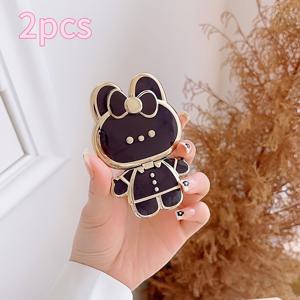 TEMU 2개의 접이식 회전식 뒷면 마운트 휴대폰 스탠드 - 토치업을 위한 작은 거울이 있는 휴대폰 홀더, 토끼 소녀의 만화 메이크업 거울이 특징입니다.