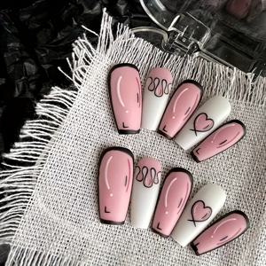 TEMU 핸드프레스 네일 세트 10개 - 블랙 라인 디테일과 하트 모양 패턴이 있는 스타일리시한 핑크와 화이트 매니큐어, 트렌디한 스트릿 스타일에 적합 - 젤리 글루와 네일 파일 포함 재사용 가능한 인조 손톱 - 캐주얼 의상, 파티 및 축제 행사에 완벽함