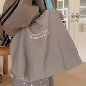 [엘루이즈][엘루이즈] 클란츠 레터링 스트링 나일론 에코백(4color)