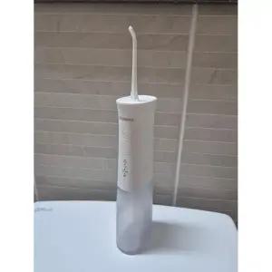 아쿠아픽 AQ-205 구강세정기 휴대용 무선 치아 물치실 칫솔 치간 세척기