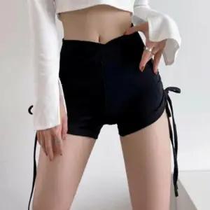 다용도 피트니스 여성 필라폴웨어 사이드 스트랩 팬츠 WFIKU2S