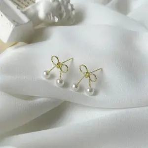 진주 리본 귀걸이 여성 유니크 데일리 패션 악세사리 (WFKBJIU)