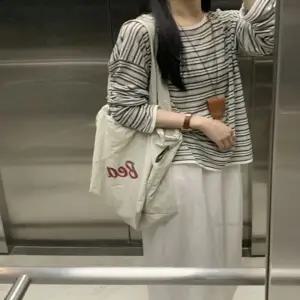 스트라이프 패션상의 루즈핏 겨울티셔츠 민트 캐주얼룩 긴팔티셔츠 여성티셔츠