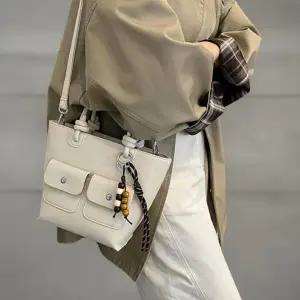 [다잇템] 여성 매듭형 키링 더블포켓 일상 들러리룩 토트백 크로스백