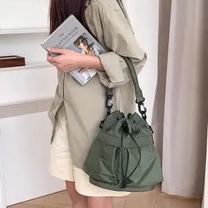 포켓 복조리 가방 버킷백