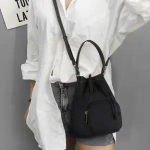 [디어백] 가벼운 앞포켓 복조리 미니 버킷백 CH3081Y