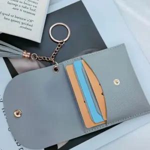 감각적인 체인 미니 키링 가방 키홀더 테슬장식 지갑 반지갑 카드홀더 여자반지갑