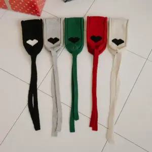 아트박스/신상오픈런 여성용 사랑스러운 배색 리본 니트 귀마개