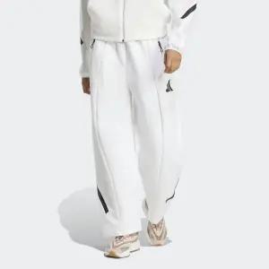 [아디다스](본점)[여성] 자연스러운 움직임을 선사하는 Z.N.E. 오픈 햄 팬츠(JL7332)