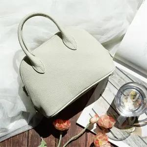 [셀러허브][라일리] Rly 캐주얼 크로스백 작은 가방 아이보리 메신저백 손가방 (S9509104)