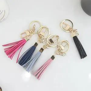 베리홀릭 소가죽 태슬장식 테슬 키링 W480885