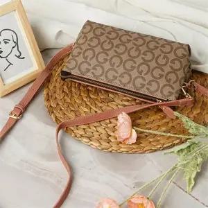 [셀러허브][라일리] Rly 데일리미니백 여성용클러치백 소품가방 브라운_라이트 (S9515771)