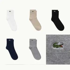 라코스테 (센텀)(남성) 남성 베이직 솔리드 피케 중목 양말 RA019E-55N (5컬러중 택1)